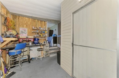 Located in the 55 +deed restricted Community of Holiday Park on Sabal Trace Golf and Country Club in Florida - for sale on GolfHomes.com, golf home, golf lot