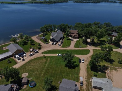 Roy Lake back lot home located on Roykota Dr. Lake City, SD with on Roy View Golf Course in South Dakota - for sale on GolfHomes.com, golf home, golf lot