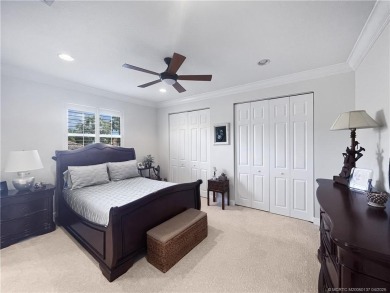 PRIVATE LAKESIDE RETREAT - This updated 5 BR, 6 bath, 4 garage on The Cape Club of Palm City in Florida - for sale on GolfHomes.com, golf home, golf lot