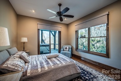 Set along the pristine shoreline of Ticoa Lake in the highly on Connestee Falls Golf Club in North Carolina - for sale on GolfHomes.com, golf home, golf lot