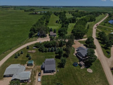 Roy Lake back lot home located on Roykota Dr. Lake City, SD with on Roy View Golf Course in South Dakota - for sale on GolfHomes.com, golf home, golf lot