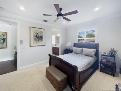PRIVATE LAKESIDE RETREAT - This updated 5 BR, 6 bath, 4 garage on The Cape Club of Palm City in Florida - for sale on GolfHomes.com, golf home, golf lot
