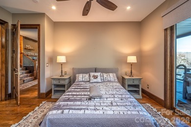 Set along the pristine shoreline of Ticoa Lake in the highly on Connestee Falls Golf Club in North Carolina - for sale on GolfHomes.com, golf home, golf lot