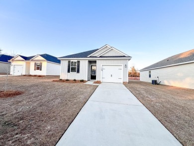 Welcome to this charming ranch style home in Clubway Commons on Players Course At Wyboo Plantation in South Carolina - for sale on GolfHomes.com, golf home, golf lot