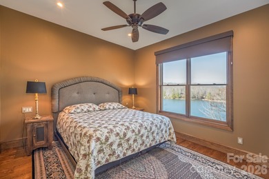 Set along the pristine shoreline of Ticoa Lake in the highly on Connestee Falls Golf Club in North Carolina - for sale on GolfHomes.com, golf home, golf lot