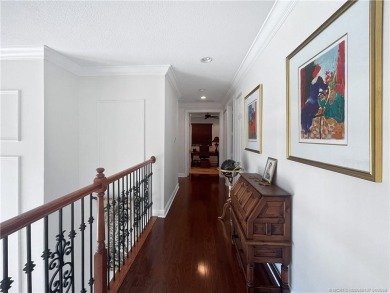 PRIVATE LAKESIDE RETREAT - This updated 5 BR, 6 bath, 4 garage on The Cape Club of Palm City in Florida - for sale on GolfHomes.com, golf home, golf lot
