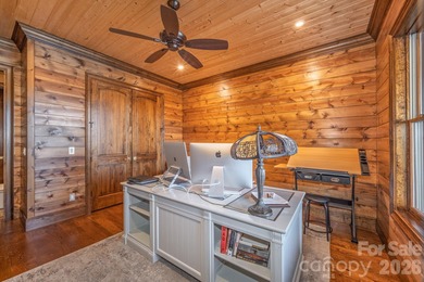 Set along the pristine shoreline of Ticoa Lake in the highly on Connestee Falls Golf Club in North Carolina - for sale on GolfHomes.com, golf home, golf lot