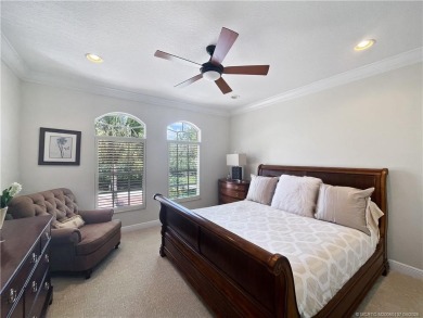 PRIVATE LAKESIDE RETREAT - This updated 5 BR, 6 bath, 4 garage on The Cape Club of Palm City in Florida - for sale on GolfHomes.com, golf home, golf lot