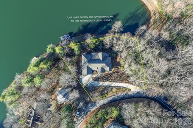 Set along the pristine shoreline of Ticoa Lake in the highly on Connestee Falls Golf Club in North Carolina - for sale on GolfHomes.com, golf home, golf lot