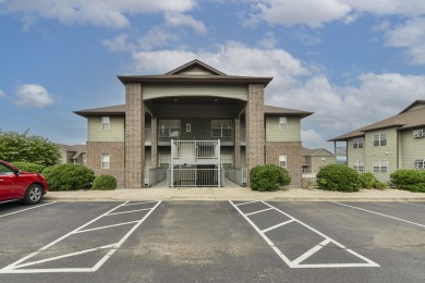 Step into this beautifully renovated 2-bedroom, 2-bath condo on Ledgestone Country Club and Golf Course in Missouri - for sale on GolfHomes.com, golf home, golf lot