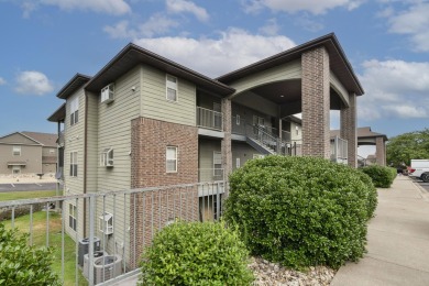 Step into this beautifully renovated 2-bedroom, 2-bath condo on Ledgestone Country Club and Golf Course in Missouri - for sale on GolfHomes.com, golf home, golf lot