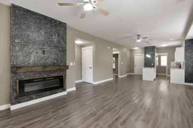 Step into this beautifully renovated 2-bedroom, 2-bath condo on Ledgestone Country Club and Golf Course in Missouri - for sale on GolfHomes.com, golf home, golf lot