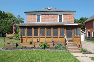 Nestled on a quiet, tree-lined street within walking distance on Spring Green Golf Course in Wisconsin - for sale on GolfHomes.com, golf home, golf lot