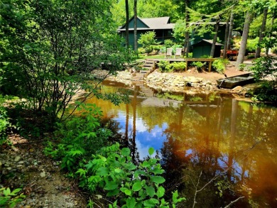 Located along the Toxaway River and the upper reaches of Lake on Lake Toxaway Country Club in North Carolina - for sale on GolfHomes.com, golf home, golf lot