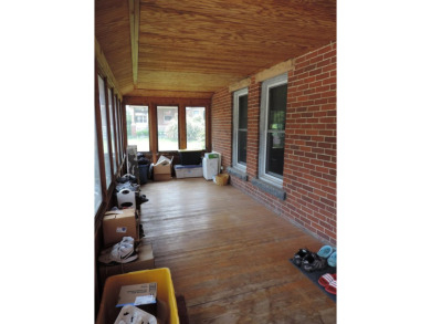 Nestled on a quiet, tree-lined street within walking distance on Spring Green Golf Course in Wisconsin - for sale on GolfHomes.com, golf home, golf lot