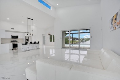 Direct Gulf Access Paradise - Where Every Day Begins on the on Burnt Store Golf Club in Florida - for sale on GolfHomes.com, golf home, golf lot