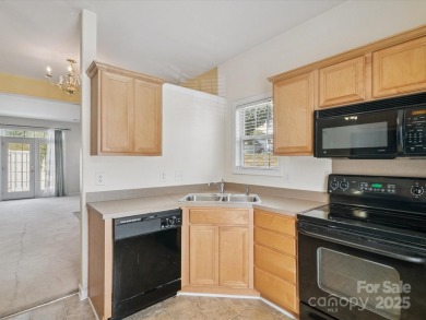 Spacious 2-bedroom, 2.5-bath end-unit townhouse. The inviting on Charles T. Myers Golf Course in North Carolina - for sale on GolfHomes.com, golf home, golf lot