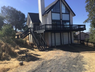 Beautiful home with massive wall of glass to take in the views on The Club at Copper Valley Golf Course in California - for sale on GolfHomes.com, golf home, golf lot