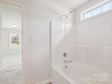 Spacious 2-bedroom, 2.5-bath end-unit townhouse. The inviting on Charles T. Myers Golf Course in North Carolina - for sale on GolfHomes.com, golf home, golf lot