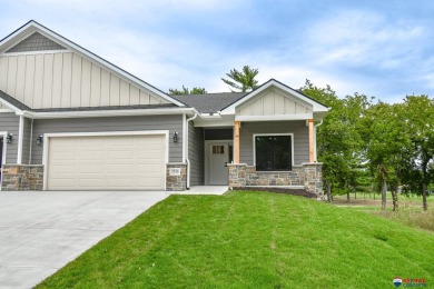 Open Sunday 1-2:30. Discover this stunning golf course backing on Jim Ager Memorial Junior Golf Course in Nebraska - for sale on GolfHomes.com, golf home, golf lot