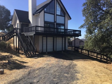 Beautiful home with massive wall of glass to take in the views on The Club at Copper Valley Golf Course in California - for sale on GolfHomes.com, golf home, golf lot
