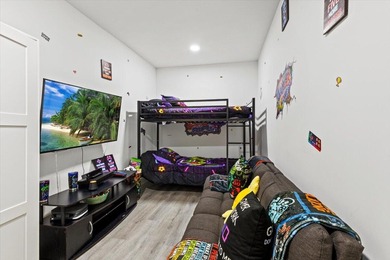 Discover the perfect blend of luxury and comfort in this on St. Lucie Trail Golf Club in Florida - for sale on GolfHomes.com, golf home, golf lot