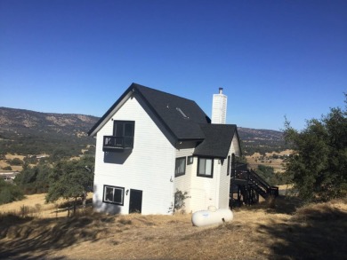 Beautiful home with massive wall of glass to take in the views on The Club at Copper Valley Golf Course in California - for sale on GolfHomes.com, golf home, golf lot