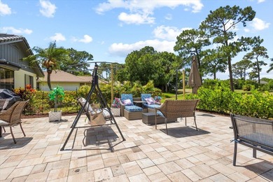 Discover the perfect blend of luxury and comfort in this on St. Lucie Trail Golf Club in Florida - for sale on GolfHomes.com, golf home, golf lot