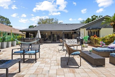 Discover the perfect blend of luxury and comfort in this on St. Lucie Trail Golf Club in Florida - for sale on GolfHomes.com, golf home, golf lot