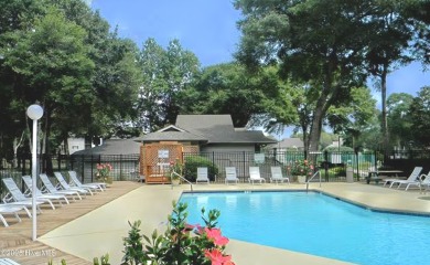 If you are looking for a coastal condo in Sunset Beach area you on Oyster Bay Golf Links in North Carolina - for sale on GolfHomes.com, golf home, golf lot