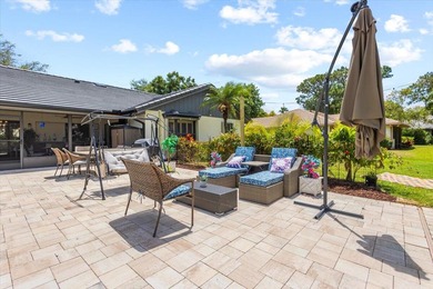 Discover the perfect blend of luxury and comfort in this on St. Lucie Trail Golf Club in Florida - for sale on GolfHomes.com, golf home, golf lot