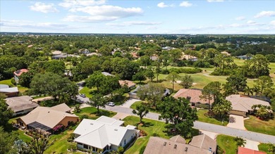 Discover the perfect blend of luxury and comfort in this on St. Lucie Trail Golf Club in Florida - for sale on GolfHomes.com, golf home, golf lot
