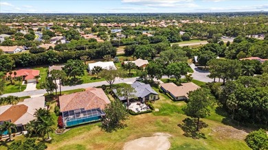 Discover the perfect blend of luxury and comfort in this on St. Lucie Trail Golf Club in Florida - for sale on GolfHomes.com, golf home, golf lot