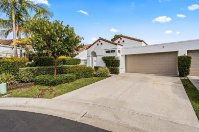 The open-concept family and dining area creates a welcoming on Ocean Hills Country Club in California - for sale on GolfHomes.com, golf home, golf lot