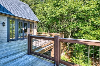 Enjoy sweeping long range  vistas from nearly every room of this on Old Edwards Club in North Carolina - for sale on GolfHomes.com, golf home, golf lot