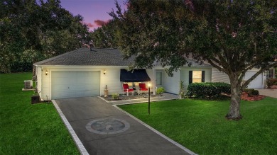 This charming 2/2 Austin Model, located in the desirable Village on The Links of Spruce Creek in Florida - for sale on GolfHomes.com, golf home, golf lot