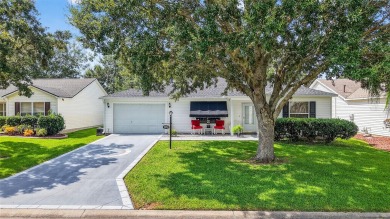 This charming 2/2 Austin Model, located in the desirable Village on The Links of Spruce Creek in Florida - for sale on GolfHomes.com, golf home, golf lot