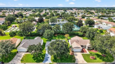 This charming 2/2 Austin Model, located in the desirable Village on The Links of Spruce Creek in Florida - for sale on GolfHomes.com, golf home, golf lot