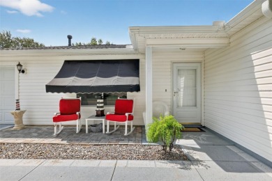 This charming 2/2 Austin Model, located in the desirable Village on The Links of Spruce Creek in Florida - for sale on GolfHomes.com, golf home, golf lot