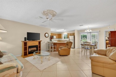 This charming 2/2 Austin Model, located in the desirable Village on The Links of Spruce Creek in Florida - for sale on GolfHomes.com, golf home, golf lot