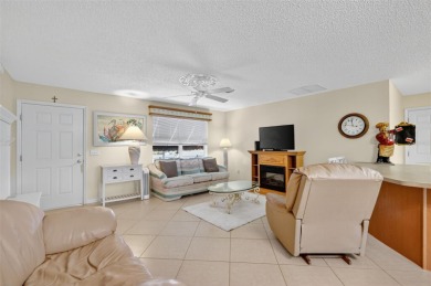 This charming 2/2 Austin Model, located in the desirable Village on The Links of Spruce Creek in Florida - for sale on GolfHomes.com, golf home, golf lot