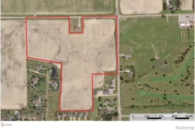 This exceptional 26+ acre parcel offers a prime opportunity for on  in Michigan - for sale on GolfHomes.com, golf home, golf lot