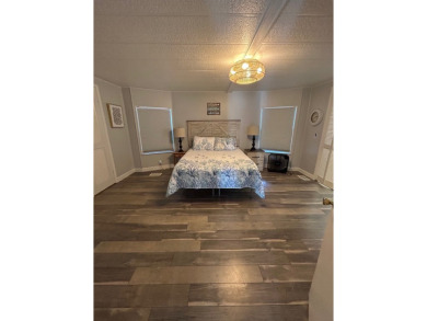 This home is located inside the beautiful 55 Plus Gated Golf on Lake Fairways Country Club in Florida - for sale on GolfHomes.com, golf home, golf lot