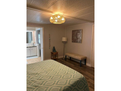 This home is located inside the beautiful 55 Plus Gated Golf on Lake Fairways Country Club in Florida - for sale on GolfHomes.com, golf home, golf lot