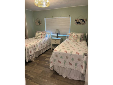 This home is located inside the beautiful 55 Plus Gated Golf on Lake Fairways Country Club in Florida - for sale on GolfHomes.com, golf home, golf lot