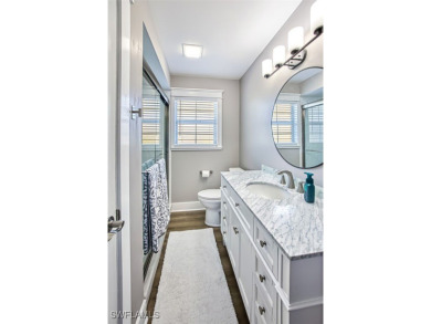 This stunning open concept/fully remodeled unit is bright with on Cypress Lake Country Club in Florida - for sale on GolfHomes.com, golf home, golf lot
