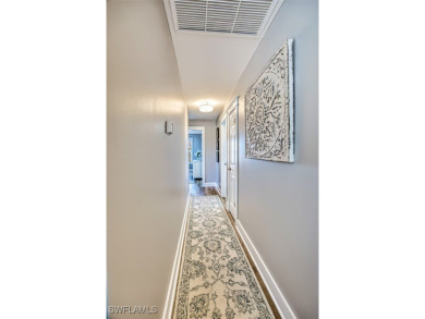 This stunning open concept/fully remodeled unit is bright with on Cypress Lake Country Club in Florida - for sale on GolfHomes.com, golf home, golf lot