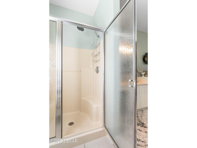 This beautiful and exceptionally clean three-bedroom on The Grand Club Cypress Course in Florida - for sale on GolfHomes.com, golf home, golf lot