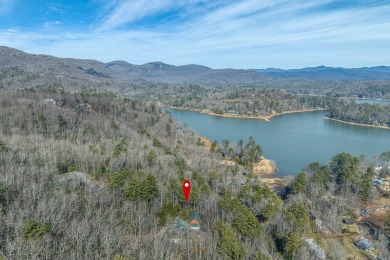If you've ever dreamed of owning a log home in the mountains on Lake Toxaway Country Club in North Carolina - for sale on GolfHomes.com, golf home, golf lot