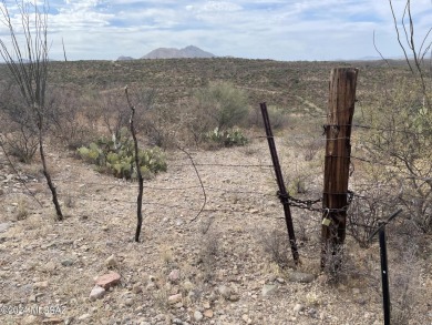 This property backs up against government land at the base of on Tubac Golf Resort and Spa in Arizona - for sale on GolfHomes.com, golf home, golf lot